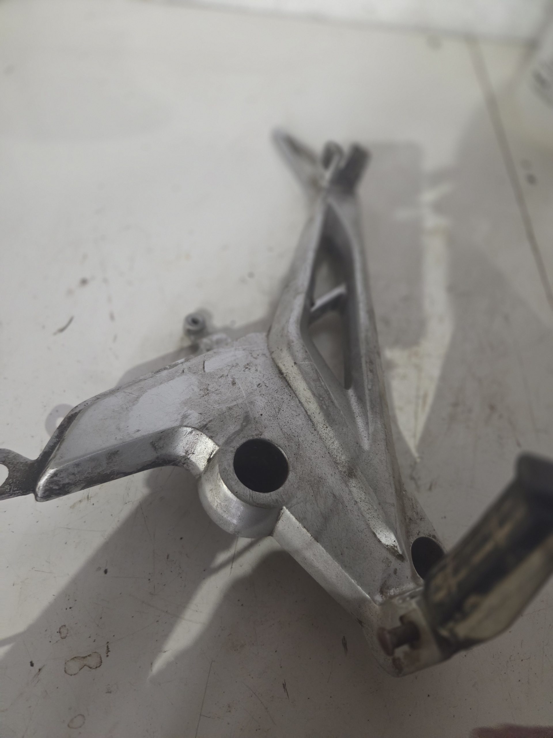 Honda CBF 2019 Left side foot peg hanger with foot peg - Image 3